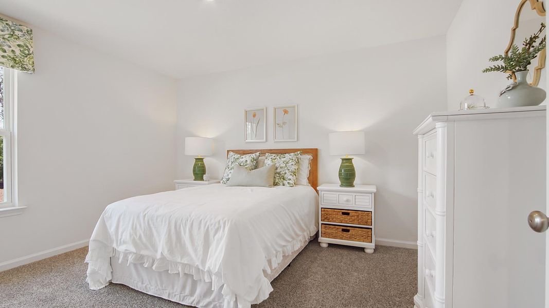 Furnished interior view inside a new home in Ashton Park Phase III, Freeport (Image 20).