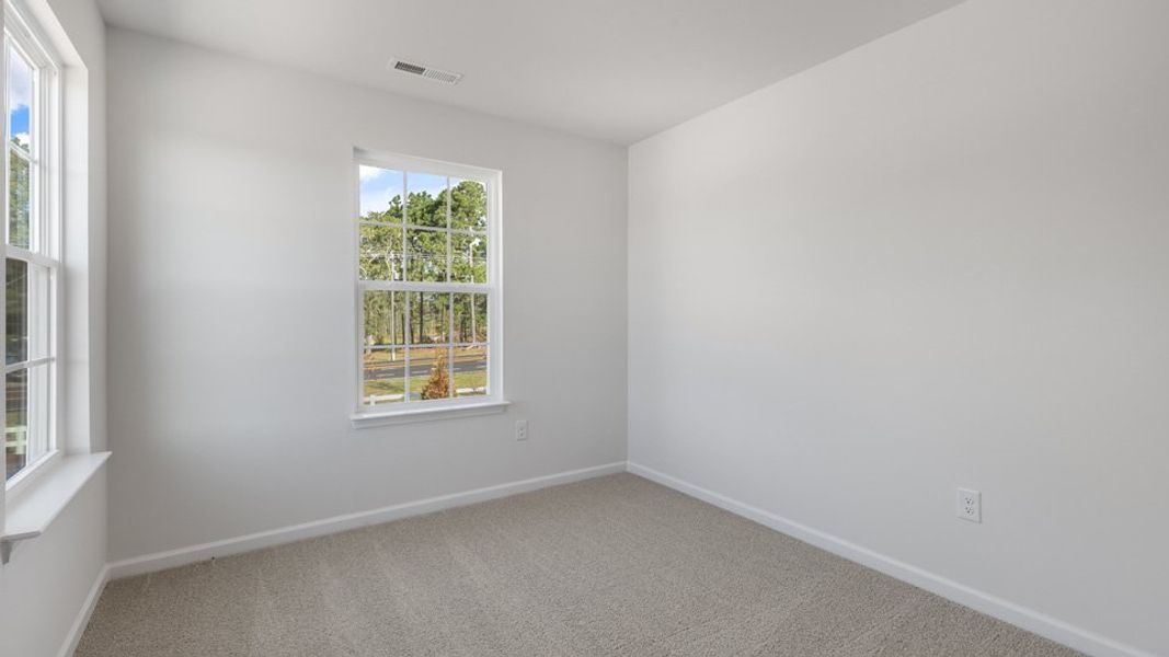 Spacious, unfurnished interior of a new home in Brightwood Farm, Whitsett (Image 11).