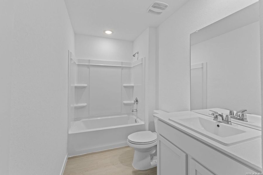 Furnished interior view inside a new home in Guadalupe Ridge, New Braunfels (Image 6).