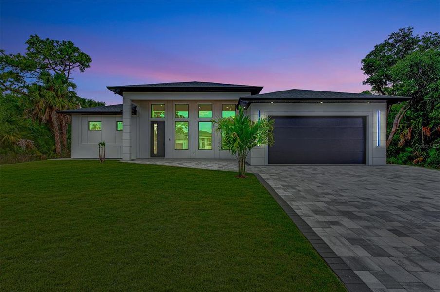 Front exterior of a new home in , North Port, FL, highlighting curb appeal (Image 30).