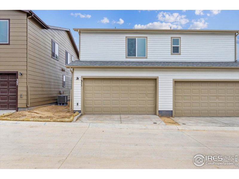 Exterior details and patio area of a home in Pintail Commons at Johnstown Village, Johnstown (Image 3).