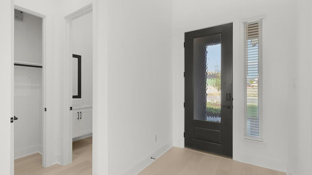Representative unfurnished interior of a home built from the Cornell by Chesmar Homes in Crescent Bluff, Georgetown (Image 10).