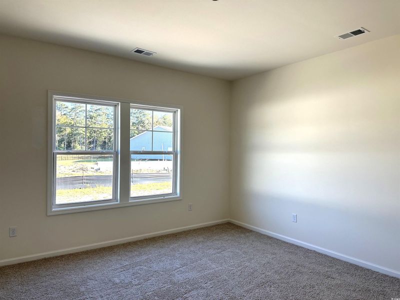 Empty room with carpet flooring and​​‌​​​​‌​​‌‌​​‌​​​‌‌​​‌​​‌​​​‌​‌​​‌‌​​​​ baseboards