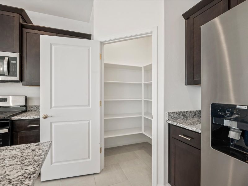 Furnished interior view inside a new home in Las Patrias at Star Valley Phase III - Premier Series, Tucson (Image 5).