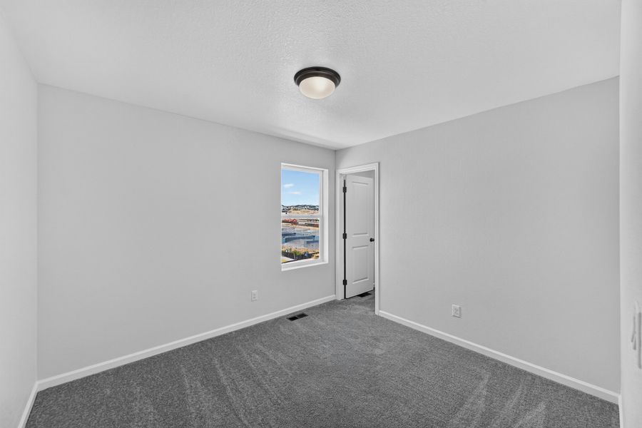 Spacious, unfurnished interior of a new home in Sky Ranch, Watkins (Image 18). Spacious, unfurnished interior of a new home in Sky Ranch, Watkins (Image 18).