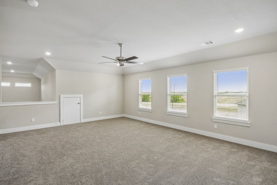 Representative unfurnished interior of a home built from the The Mockingbird by Lillian Custom Homes in Polo Ridge, Forney (Image 44).