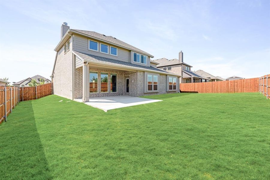 Exterior details and patio area of a home in The Grove, Midlothian (Image 16).