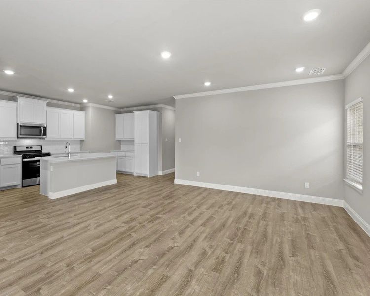 Representative furnished interior of a home built from the Nevada by BLUEHAVEN Homes in Lakepointe, Lavon (Image 13).