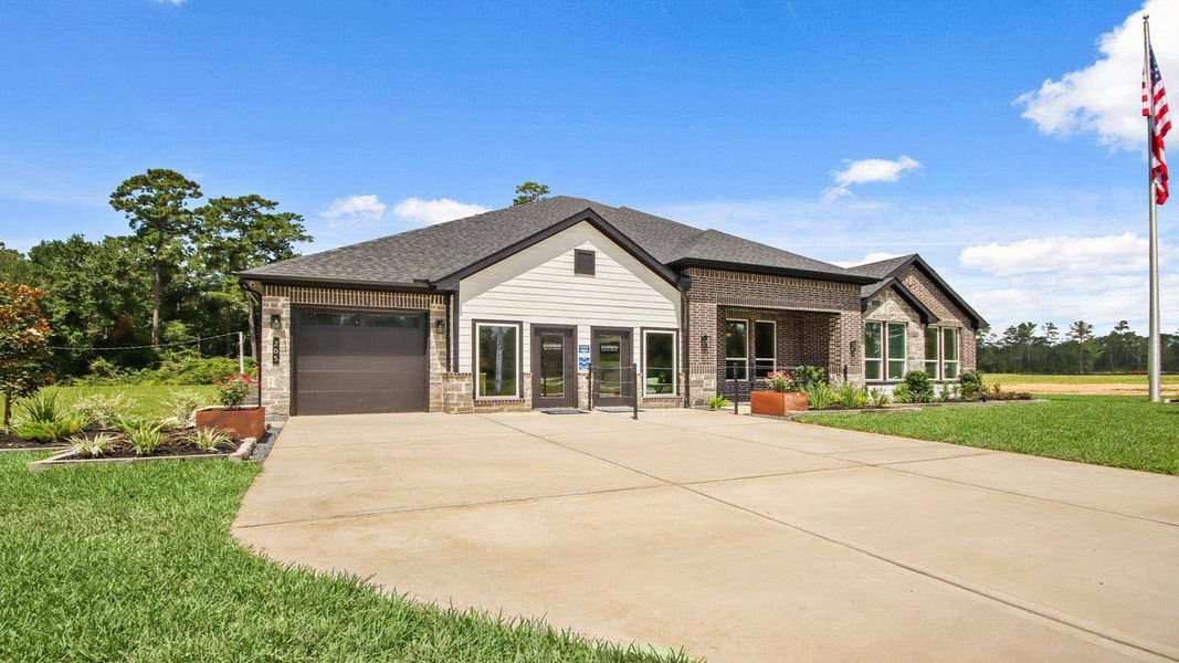 Front exterior of a new home in Butlers Bend Estates, Pinehurst, TX, highlighting curb appeal (Image 24).