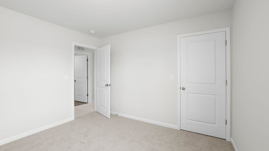 Spacious, unfurnished interior of a new home in Varner Station, Woodruff (Image 27).