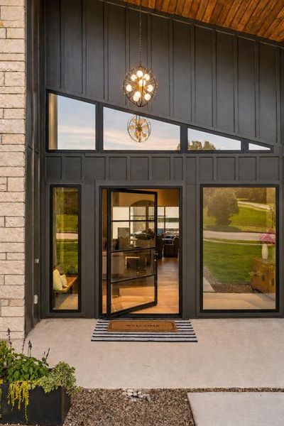 Enter through your cantilevered iron door to a foyer perfect for art and natural light.