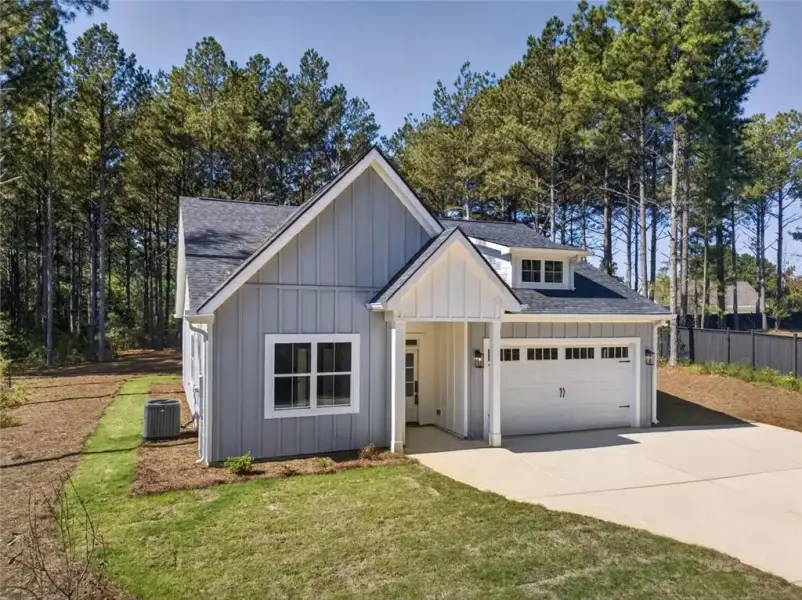 Front exterior of a new home in , Dallas, GA, highlighting curb appeal (Image 24). Front exterior of a new home in , Dallas, GA, highlighting curb appeal (Image 24).