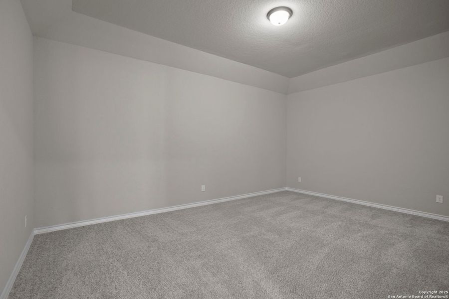 Spacious, unfurnished interior of a new home in Potranco Oaks, Castroville (Image 53).