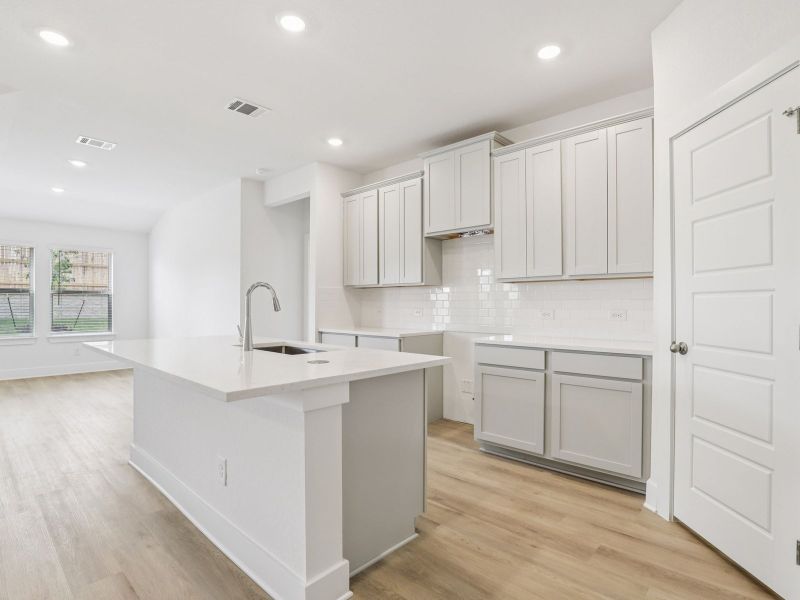 Kitchen in the Callaghan floorplan at a Meritage Homes community.