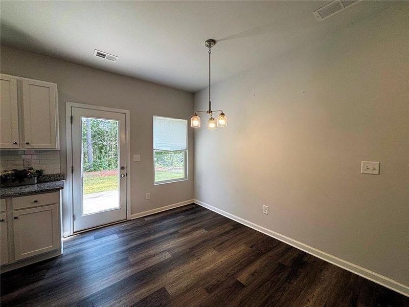 Spacious, unfurnished interior of a new home in Bryson Lake, Douglasville (Image 23).