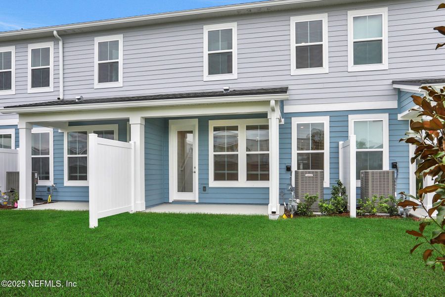 Exterior details and patio area of a home in Silver Landing at SilverLeaf, St. Augustine (Image 19).