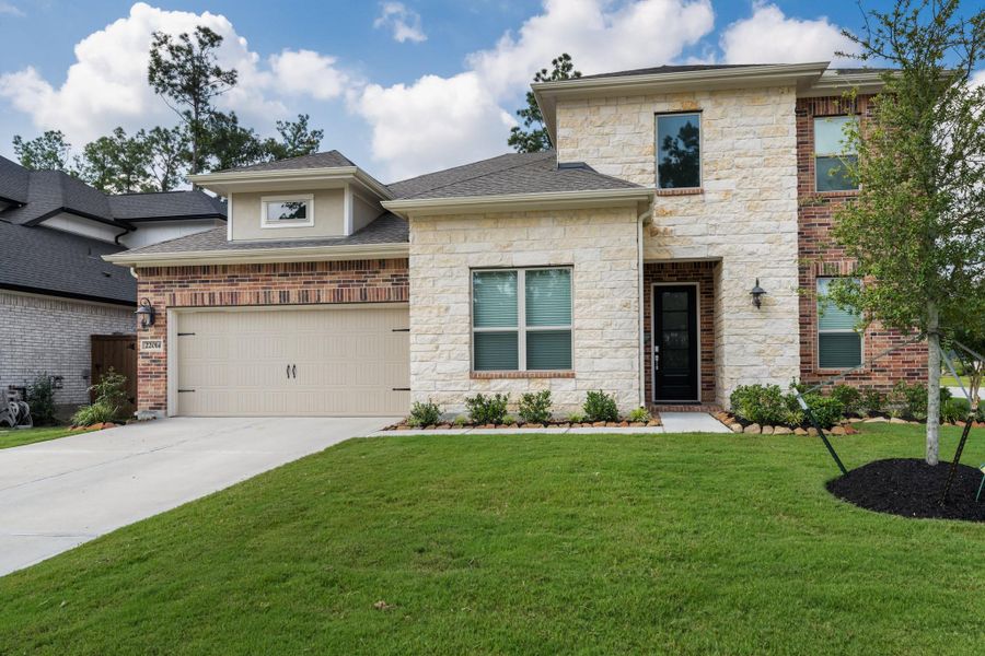 Front exterior of a new home in The Highlands: Pinnacle Collection, Porter Heights, TX, highlighting curb appeal (Image 18).