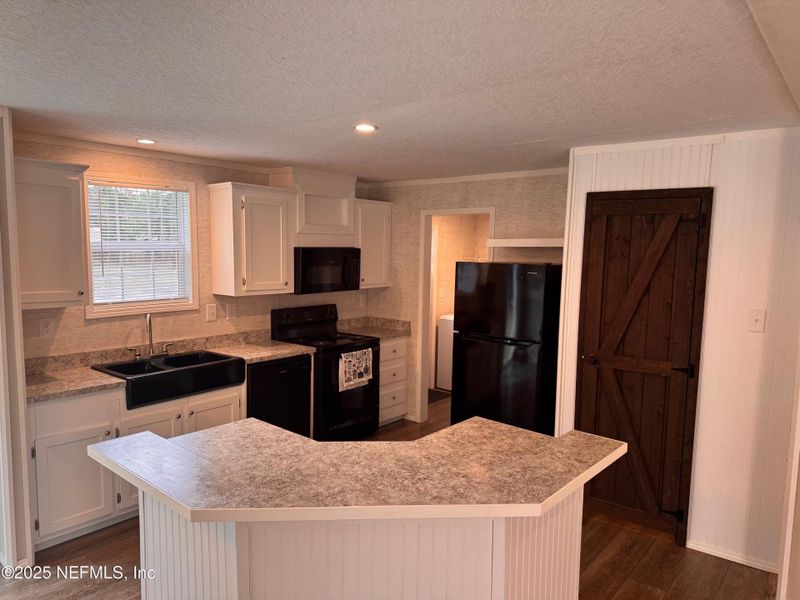Furnished interior view inside a new home in , Fernandina Beach (Image 3).