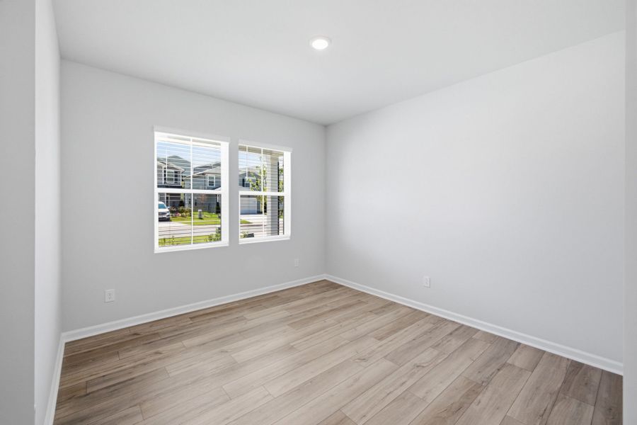 Spacious, unfurnished interior of a new home in Carpenter Falls, Durham (Image 22).