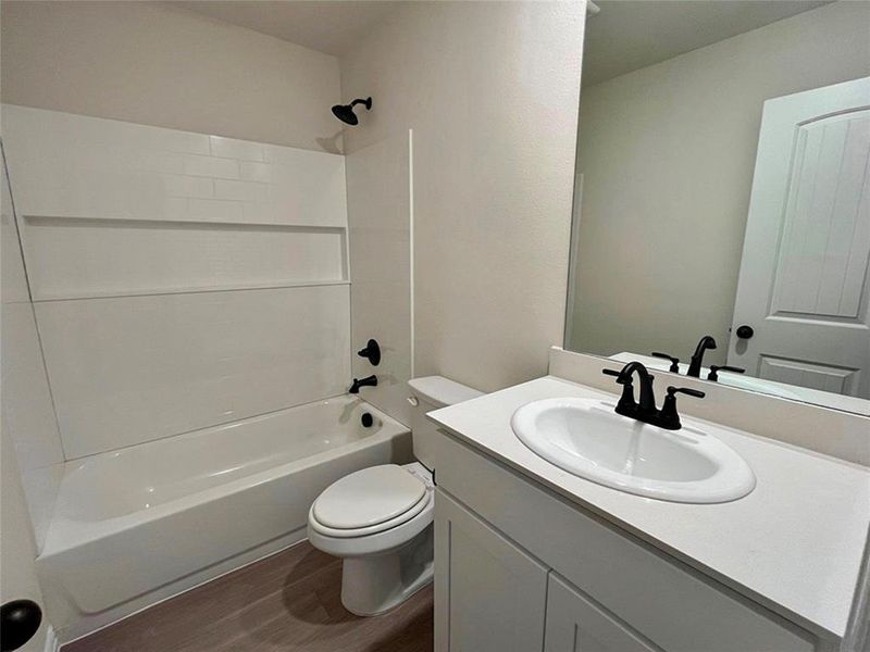 Furnished interior view inside a new home in Labein Villas, Greenville (Image 13).