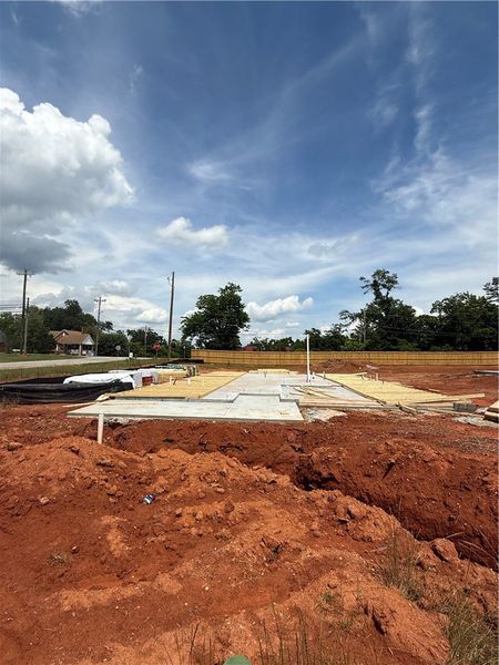 Construction under way. Foundation laid on a spaci