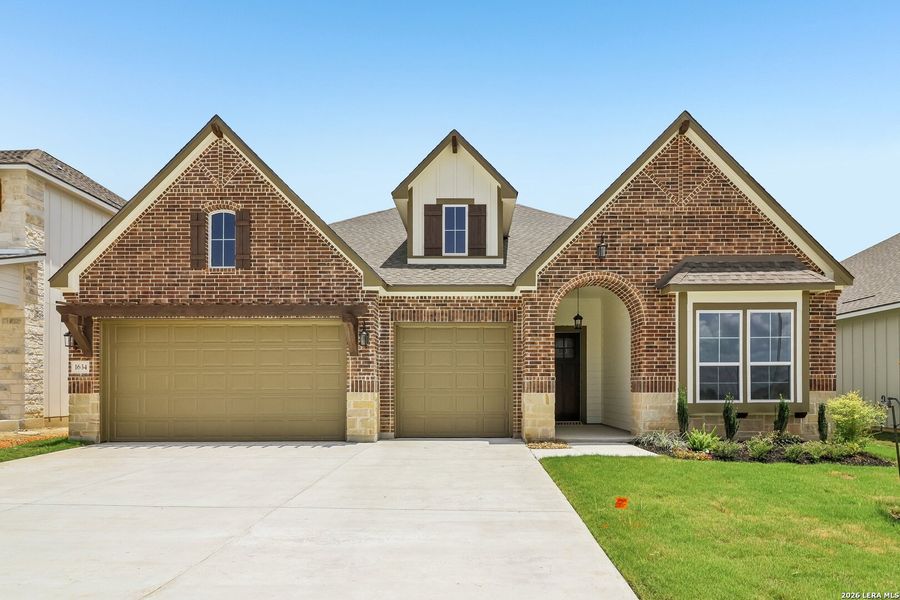 Front exterior of a new home in Weltner Farms 60’s, New Braunfels, TX, highlighting curb appeal (Image 1). Front exterior of a new home in Weltner Farms 60’s, New Braunfels, TX, highlighting curb appeal (Image 1).