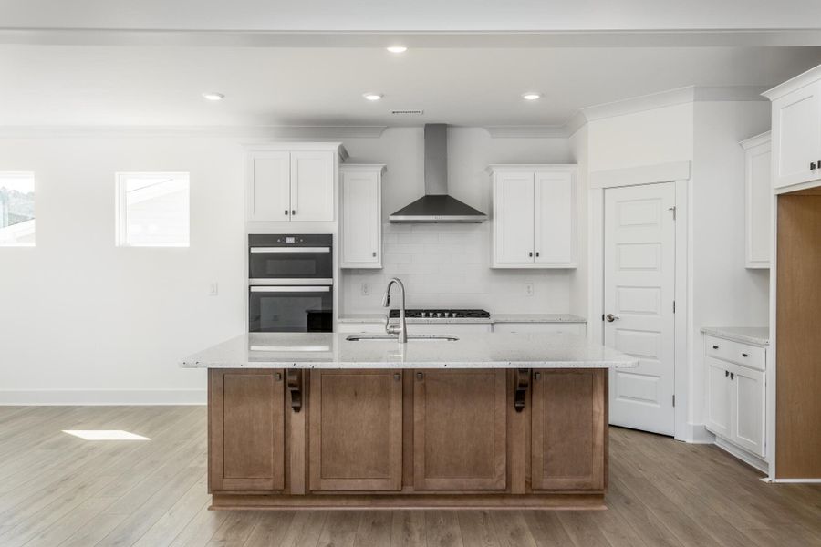 Furnished interior view inside a new home in The Enclave at Hidden Lake - 55+ Community, Youngsville (Image 7).