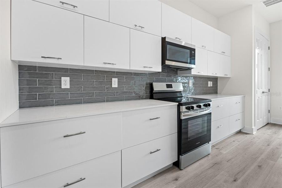 Furnished interior view inside a new home in , Port Charlotte (Image 6). Furnished interior view inside a new home in , Port Charlotte (Image 6).