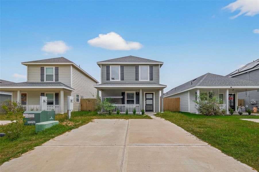 Front exterior of a new home in Marie Village, Conroe, TX, highlighting curb appeal (Image 1). Front exterior of a new home in Marie Village, Conroe, TX, highlighting curb appeal (Image 1).
