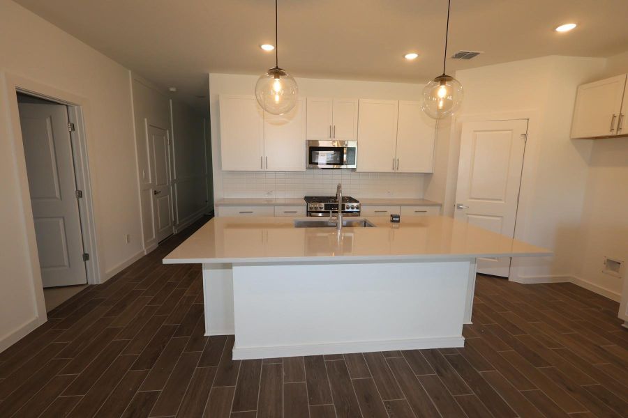 Furnished interior view inside a new home in Aspire at Ashland, Angleton (Image 7).
