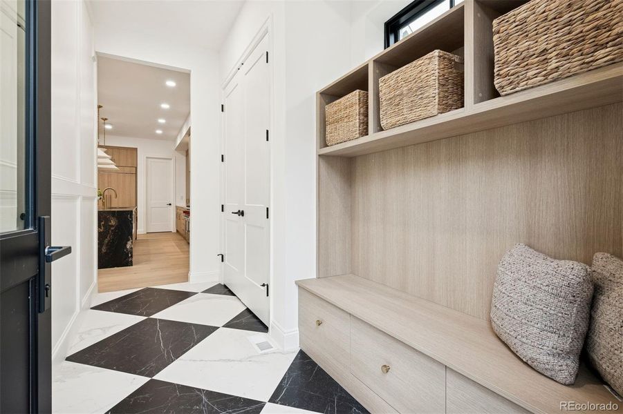 Mudroom with beautiful built ins.