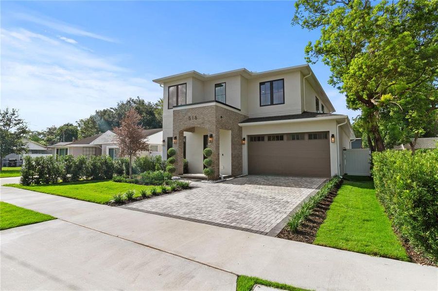 Front exterior of a new home in , Orlando, FL, highlighting curb appeal (Image 26). Front exterior of a new home in , Orlando, FL, highlighting curb appeal (Image 26).