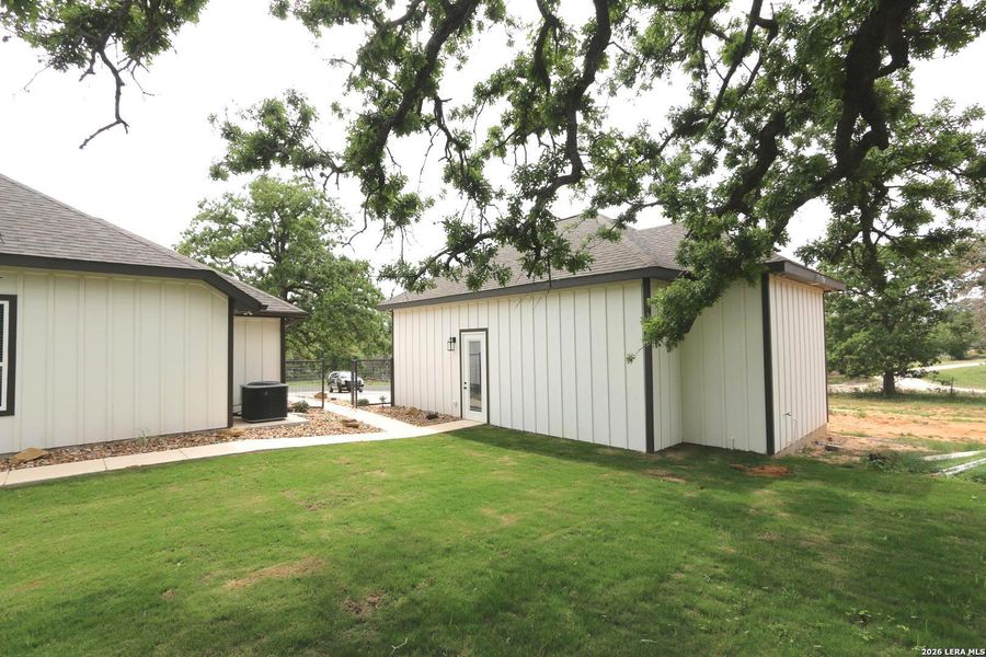 Exterior details and patio area of a home in , La Vernia (Image 39).