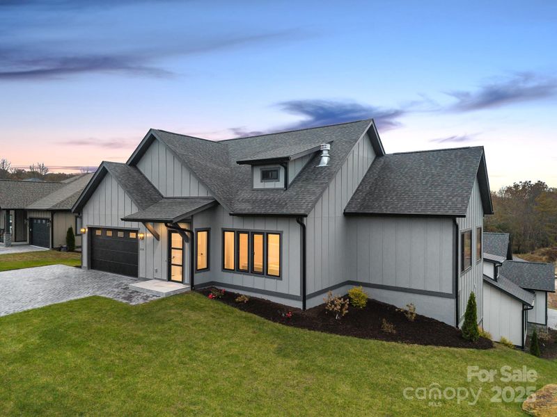Front exterior of a new home in , Arden, NC, highlighting curb appeal (Image 1). Front exterior of a new home in , Arden, NC, highlighting curb appeal (Image 1).