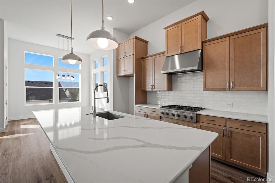 Furnished interior view inside a new home in Cloverleaf - Pinnacle Collection, Monument (Image 11).