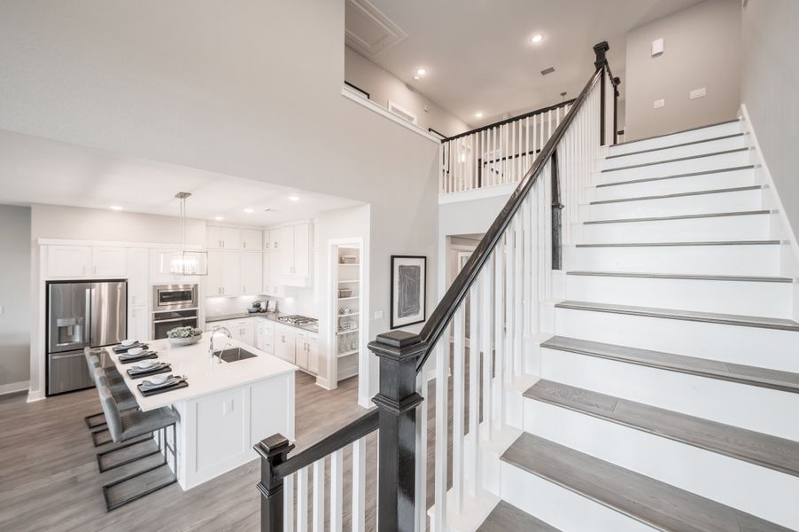 Representative furnished interior of a home built from the Barnhart by Tri Pointe Homes in Dunham Pointe, Cypress (Image 33).