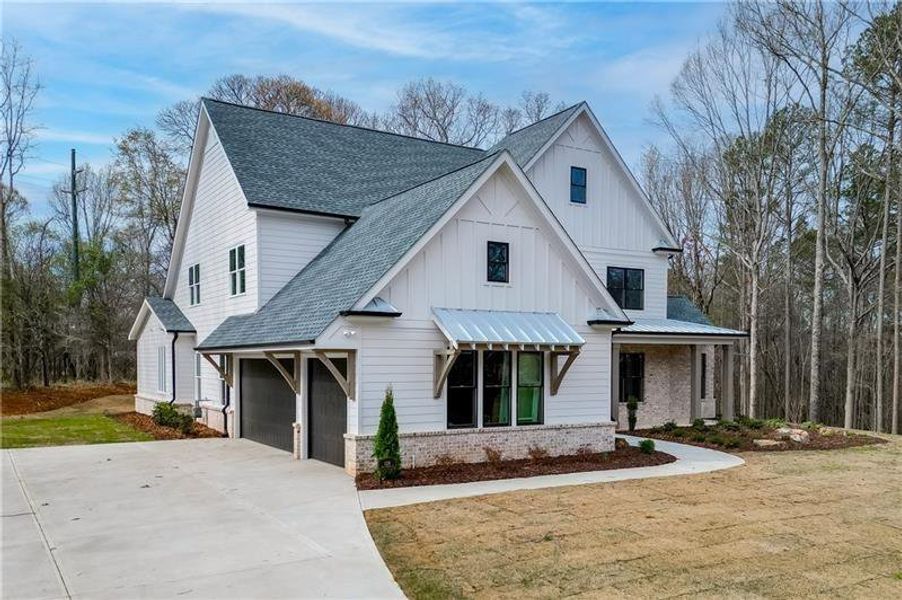 Front exterior of a new home in , Pendergrass, GA, highlighting curb appeal (Image 26).