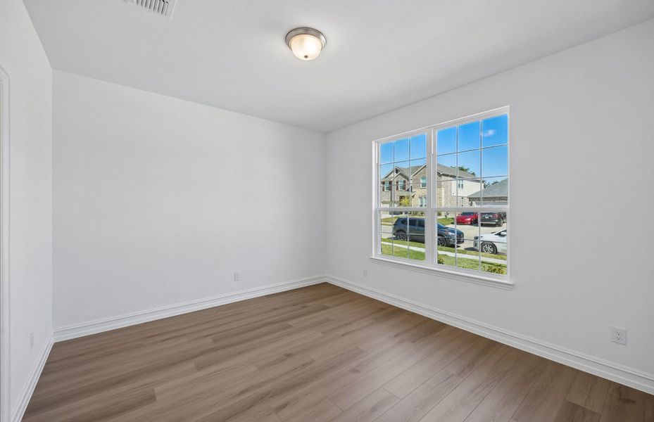 Spacious, unfurnished interior of a new home in Rosemary Fields, Godley (Image 15).