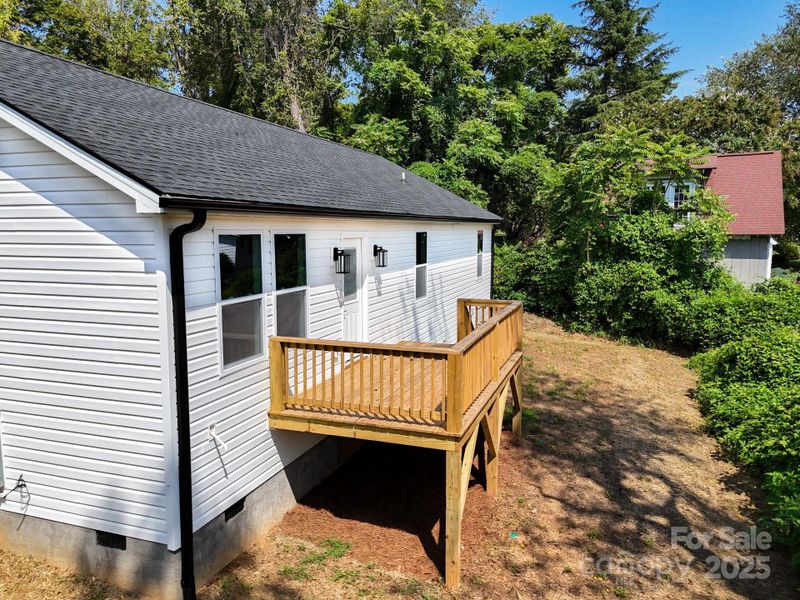 Front exterior of a new home in , Asheville, NC, highlighting curb appeal (Image 23).