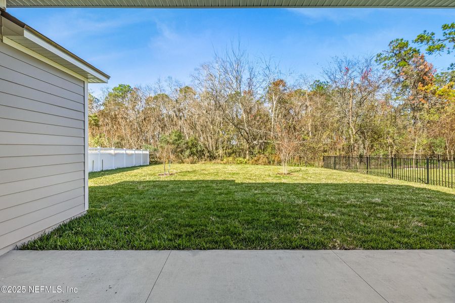 Exterior details and patio area of a home in Silver Landing at SilverLeaf, St. Augustine (Image 37).