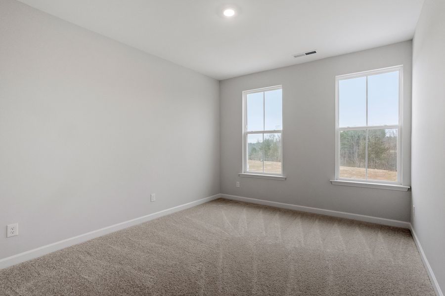 Spacious, unfurnished interior of a new home in Ovation at Sweetbrier, Durham (Image 21).
