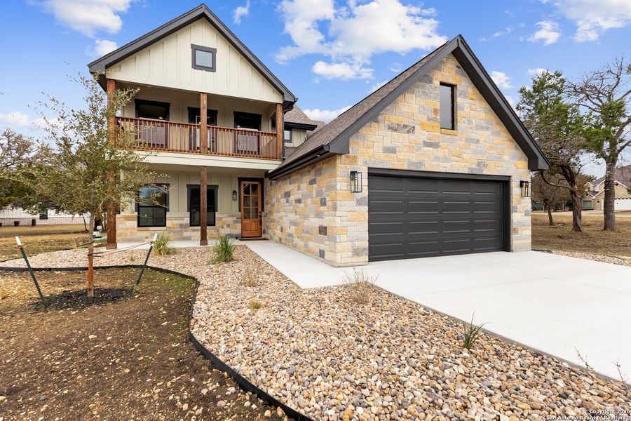 Front exterior of a new home in , Bandera, TX, highlighting curb appeal (Image 24). Front exterior of a new home in , Bandera, TX, highlighting curb appeal (Image 24).