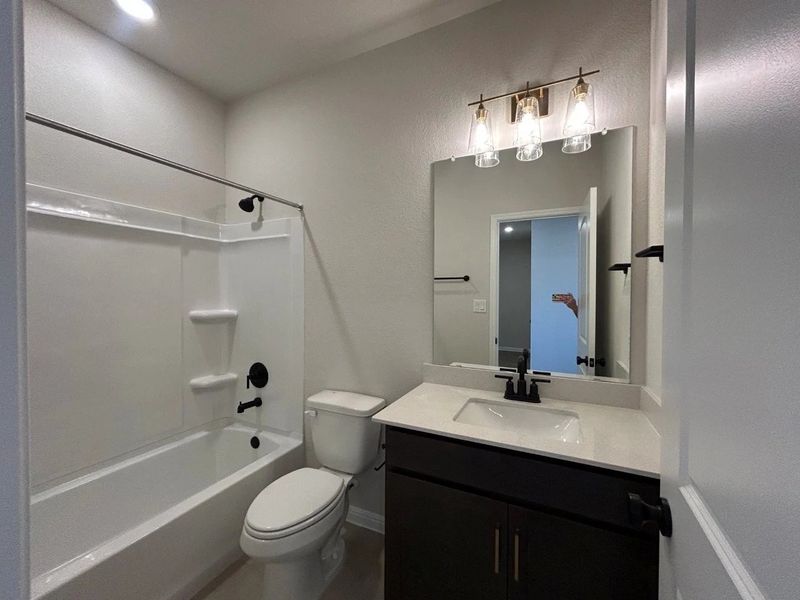 Furnished interior view inside a new home in Willow Springs, Buda (Image 4).