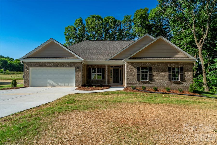 Front exterior of a new home in , Monroe, NC, highlighting curb appeal (Image 2). Front exterior of a new home in , Monroe, NC, highlighting curb appeal (Image 2).