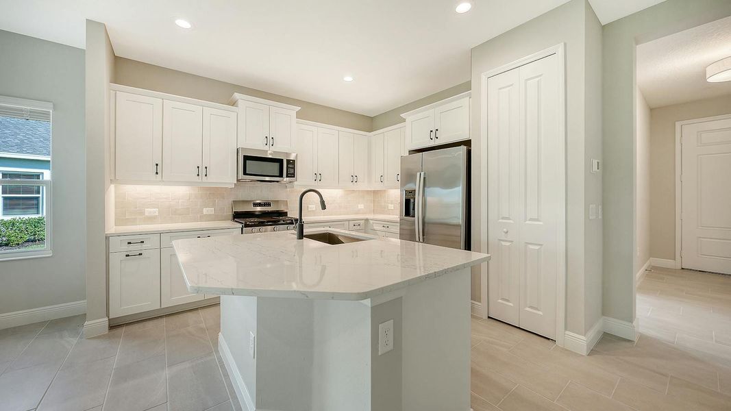 Furnished interior view inside a new home in Wildleaf Real Estate and Homes for Sale in Parrish, FL - Neal Communities, Parrish (Image 11).