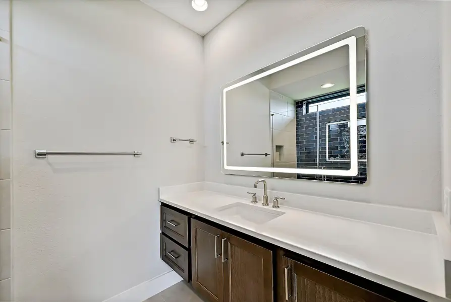 Full bath off patio.