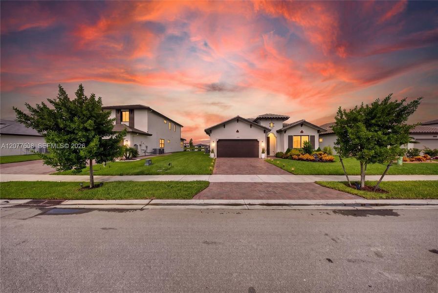 Front exterior of a new home in , Immokalee, FL, highlighting curb appeal (Image 25).