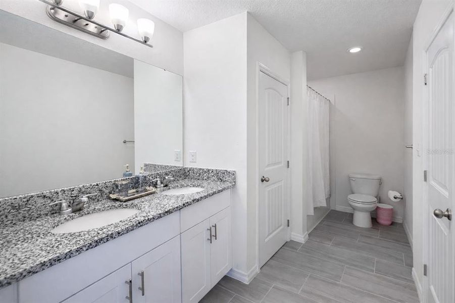 Furnished interior view inside a new home in Waterleigh, Winter Garden (Image 24).