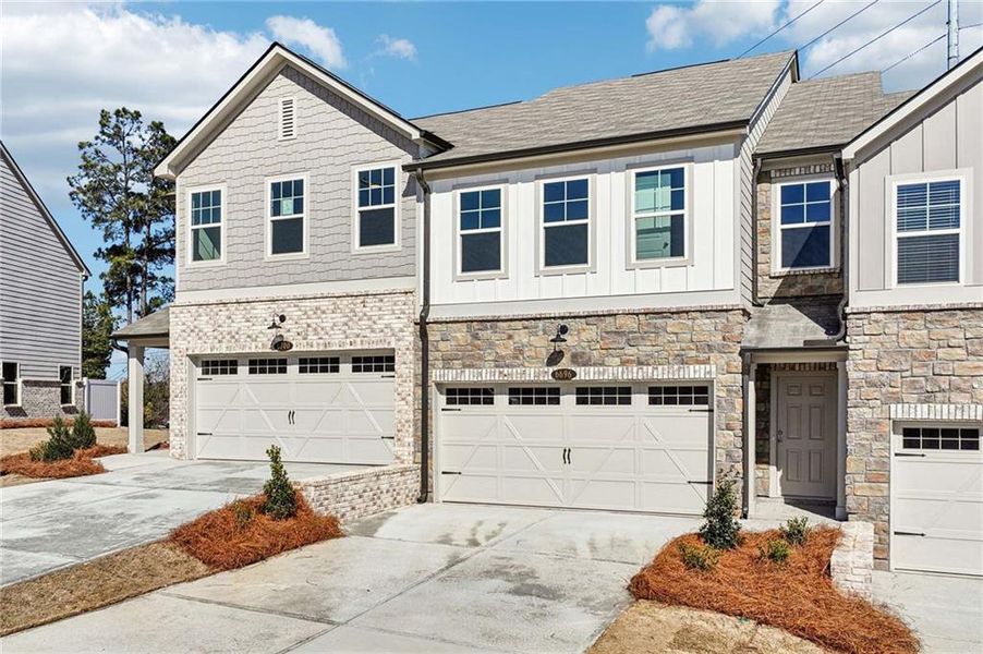 Front exterior of a new home in Leydenview, Mableton, GA, highlighting curb appeal (Image 18).
