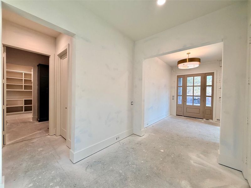 2203 Cheshire - Center Hall axis leading to Powder Bath, Mud Room and Pantry - Construction Status as of 2/13/2026 2203 Cheshire - Center Hall axis leading to Powder Bath, Mud Room and Pantry - Construction Status as of 2/13/2026